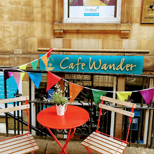 Cafe Wander shopfront on West George Street with colourful bunting