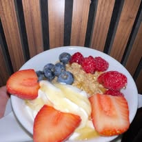Yoghurt, granola and fresh fruit plate